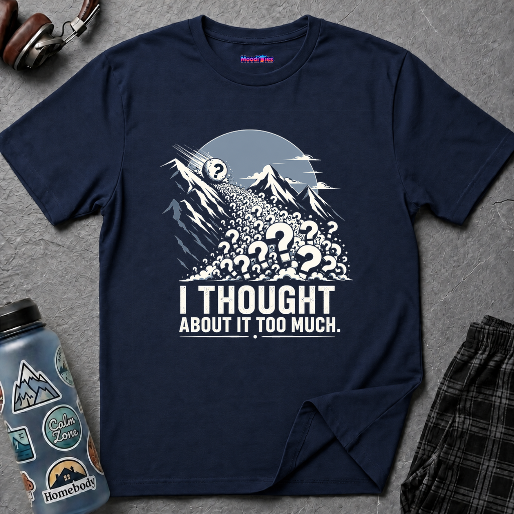 Mountain scene with an avalanche of question marks rushing downhill and the text I THOUGHT ABOUT IT TOO MUCH.