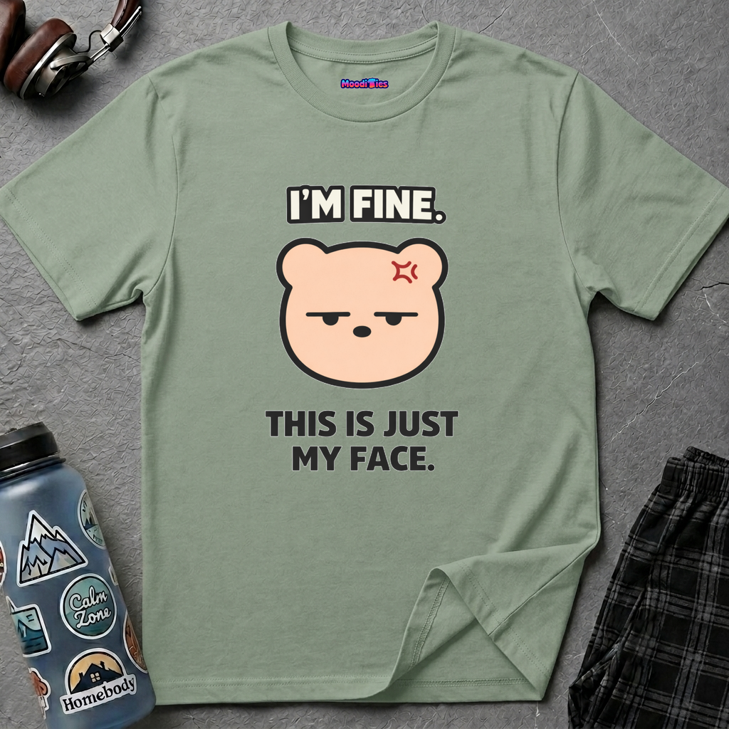 Cute deadpan bear face illustration with the phrase “I’m Fine. This Is Just My Face.” in bold black lettering.