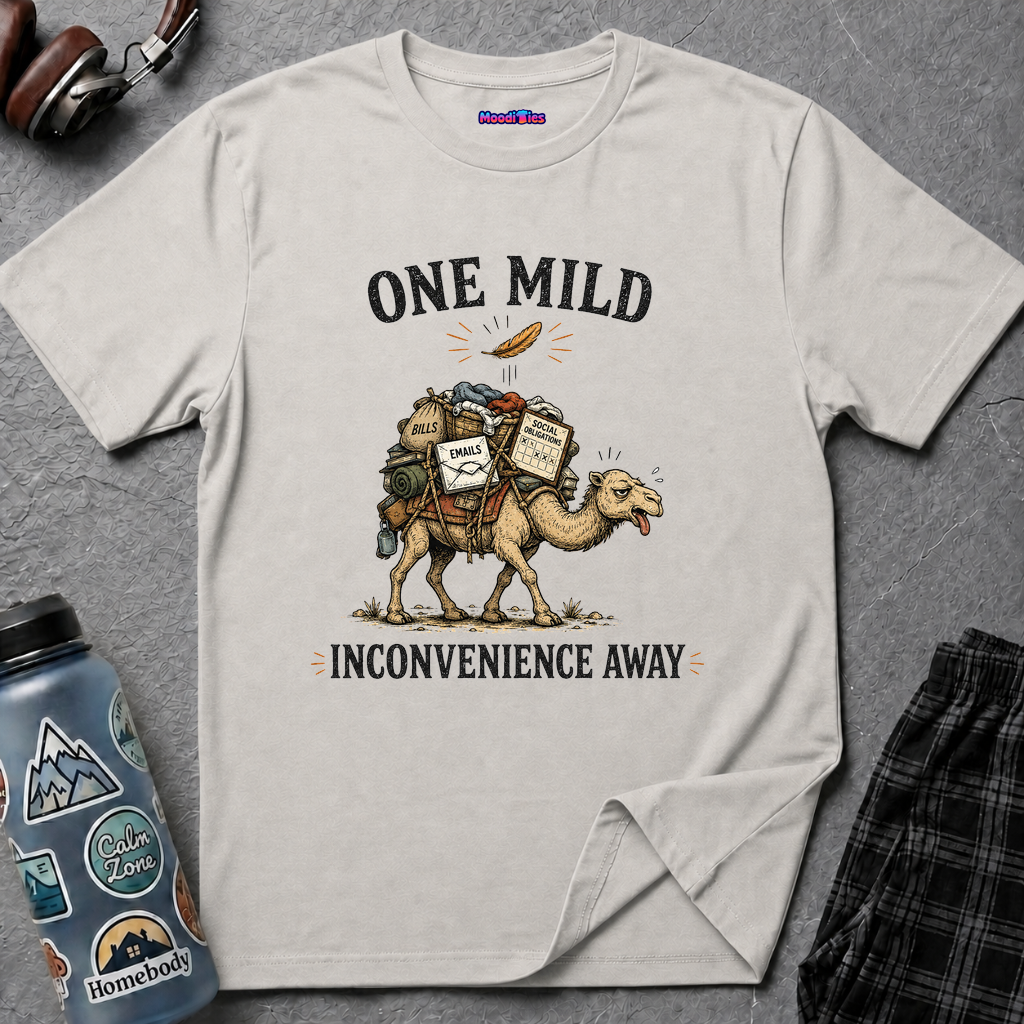 Camel overloaded with bags labeled bills emails social obligations, tired expression below text ONE MILD INCONVENIENCE AWAY